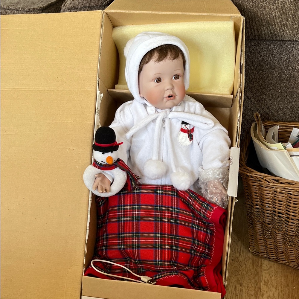 Adorable Baby Doll with Snowman Accessory